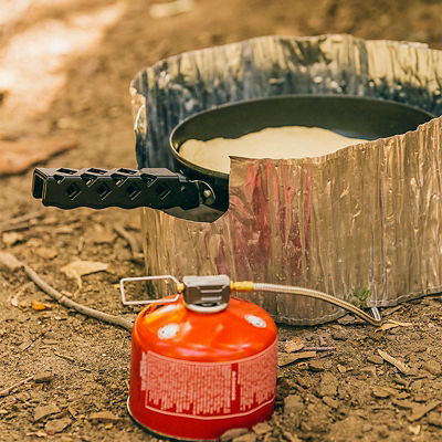 Food being prepared on a camping trip with small camping sized equipment