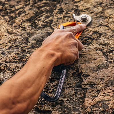 A man clips into an anchor