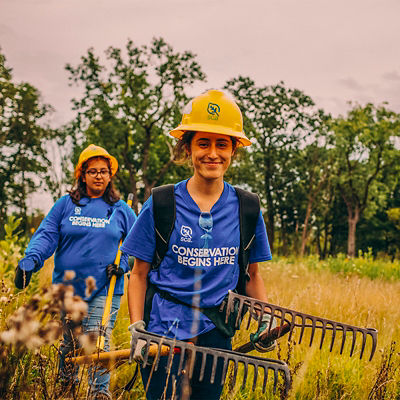 Students walking with tools