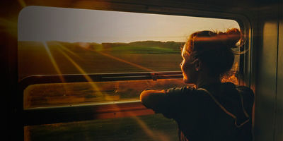 A woman traveling by train