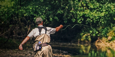 A fly-fisherman in Clear Creek at Clear Creek Metro Park. 