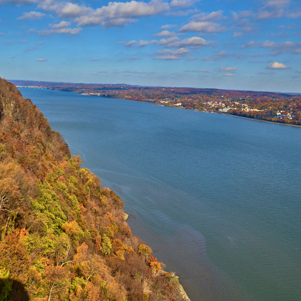 New York state line lookout over the Palisade cliffs and the Hudson river in the fall. 
