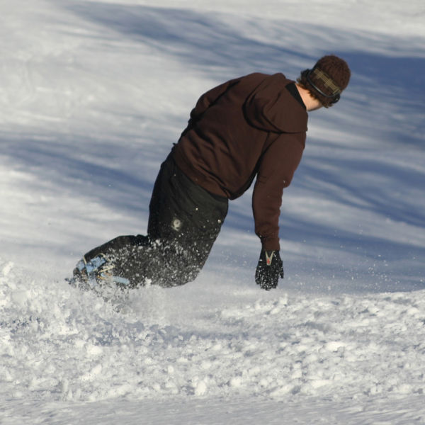 A snowboarder descending a slope at Mount Wachusett in Massachusetts.
