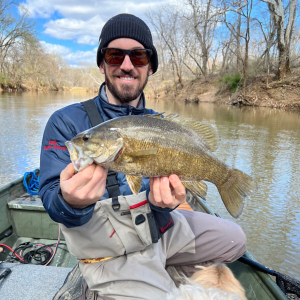 A fisherman holds a smallmouth on Virginia’s Historic James River