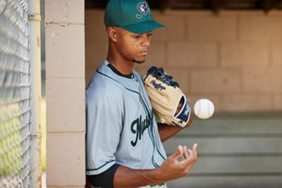 Image of a baseball player holding a baseball