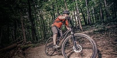 A man bikes in Chestnut Ridge Metro Park 