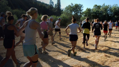 Runners run a race on the Britt Woods Loop