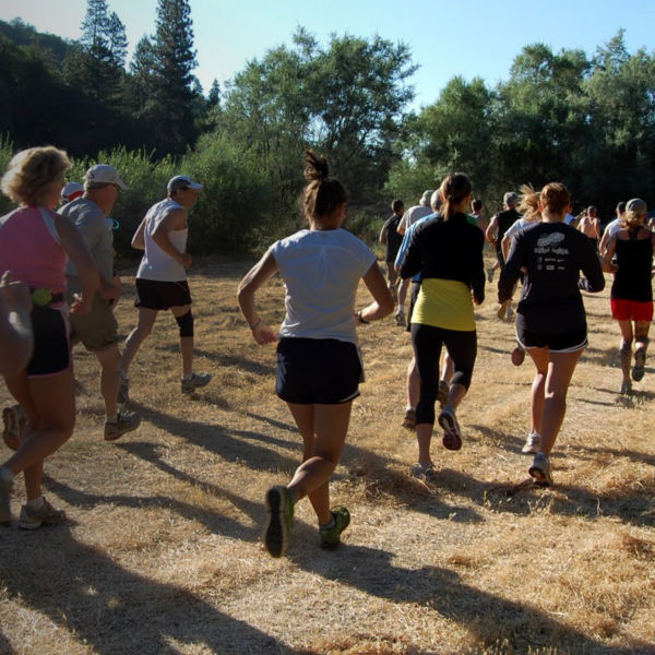 Runners run a race on the Britt Woods Loop