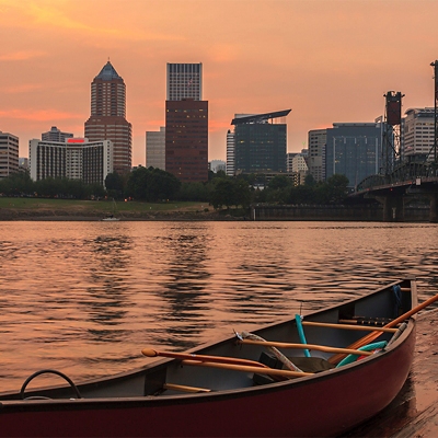 A canoe at sunset on the Willamette River in Portland, Oregon