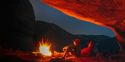 Cave camping with a campfire in the San Rafael Wilderness, California