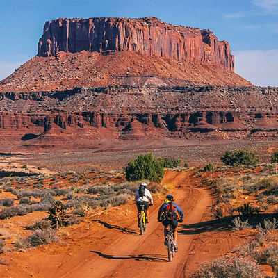 Bikers on the White Rim Road at Canyonlands.