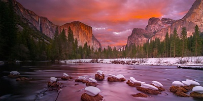 Yosemite National Park at dusk with snow caps