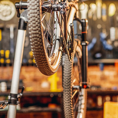 A bike getting fixed on a repair stand