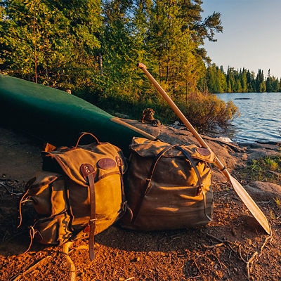 Classic canoe packs and gear at a campsite on Bat Lake in the Boundary Waters Canoe Area Wilderness.