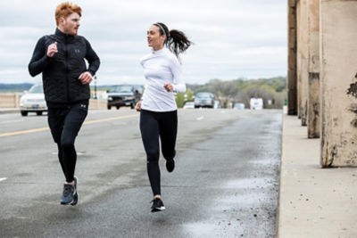 Picture of people running wearing running tights.