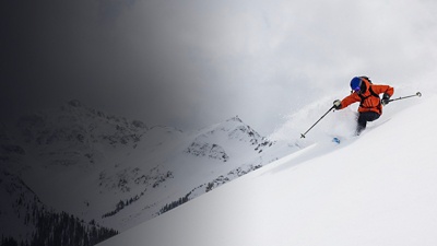 An action shot of Connor Ryan skiing 