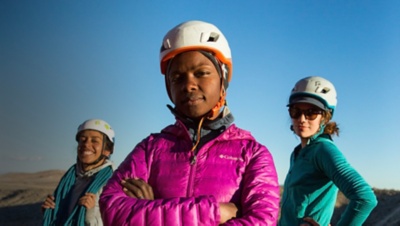 3 women rock climbers pose for a photo