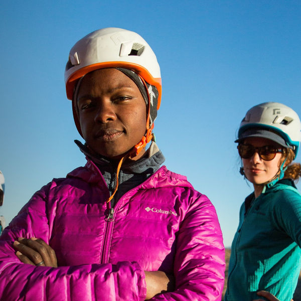 3 women rock climbers pose for a photo