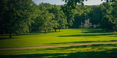 Squires Castle, an old ruin, originally a gatehouse for a main residence that was never built, stands on an expansive lawn in the North Chagrin Reservation near Cleveland.