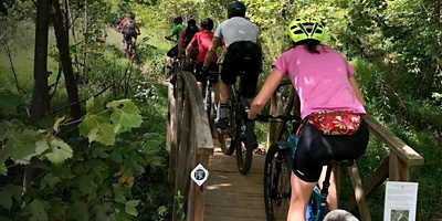 Rivanna Trails Foundation members bike on the trail