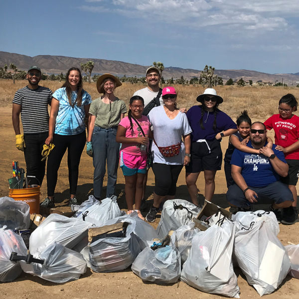 Members of the Hispanic Access Foundation help in a cleanup