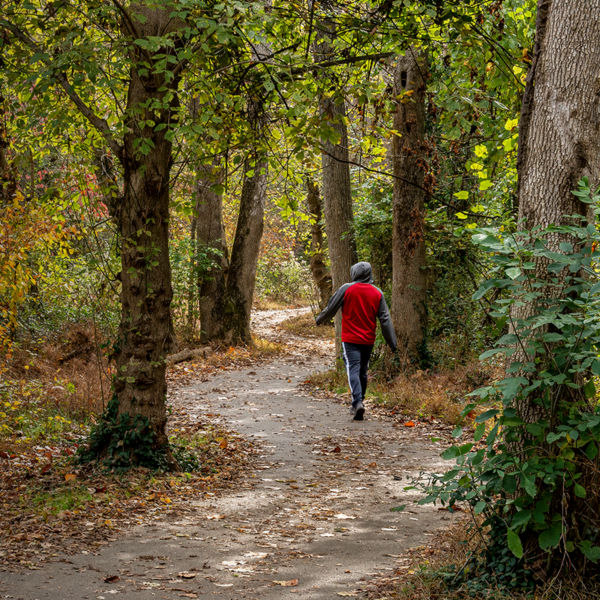 Man on Rivanna Trail along the Rivanna River in Charlottesville, Virginia.