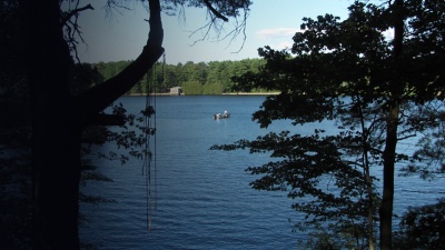 A boat is seen out on Lake Cochituate, Cochituate Massachusetts