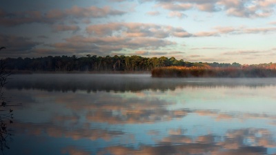 An evening view of the Carmans River in Wertheim National Wildlife Refuge , New York