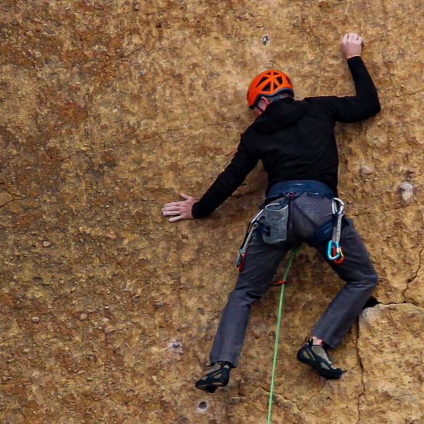 A close up shot of a rock climber