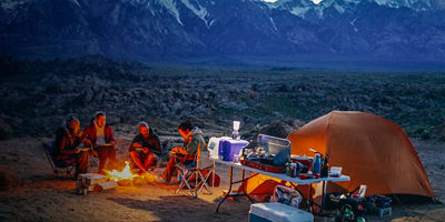 Group of people around a campfire