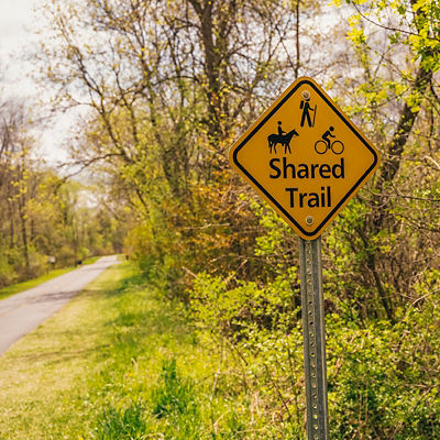 Shared Trail (hiking, biking, and horseback riding activities) sign in Elm Creek Park Reserve in Maple Grove, MN