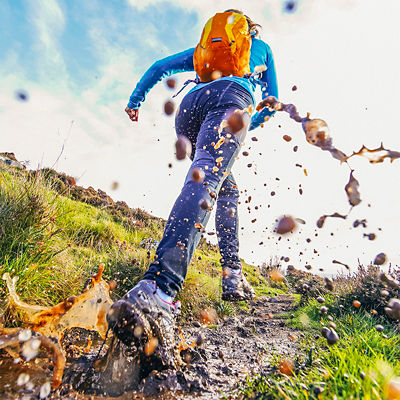 Trail running in the mud on the isle of Skye, Scotland.