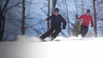 Skiiers ski at Pats peak