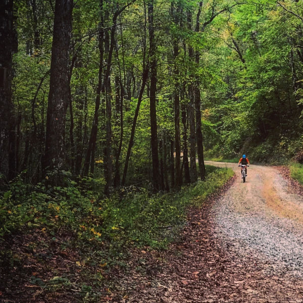 A biker rides on the fire road in Mulberry Gap, Georgia