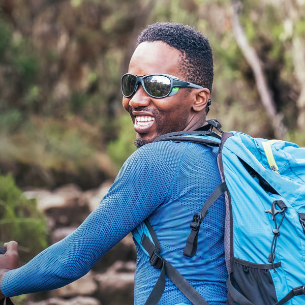 Portrait of a smiling young man in sunglasses.