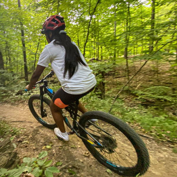 A mountain biker rides a trail in Alum Creek SP