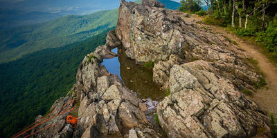 Rock climbing ropes attached to rocks on Little Stony Man Cliffs, in Shenandoah National Park, Virginia.
