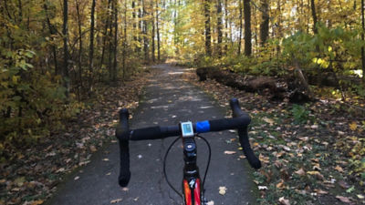 Bike handlebars are seen looking on the Columbus loop trail