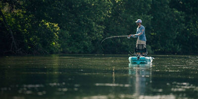 A man fishes from a kayak