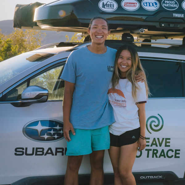 Haley Toy and Gary Huey pose with their Subaru