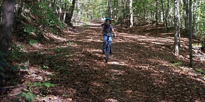 A mountain biker on the Southside Trail in New River Gorge National Park and Preserve