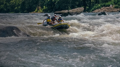 Rafters paddle past Fayette Station Bridge