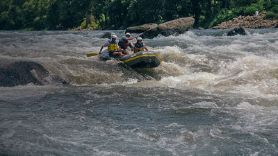 Rafters paddle past Fayette Station Bridge