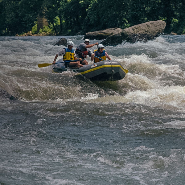 Rafters paddle past Fayette Station Bridge