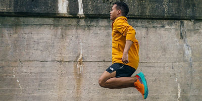 Runner jumping to warm up