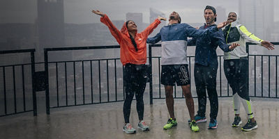 Four runners in the rain in Pittsburgh
