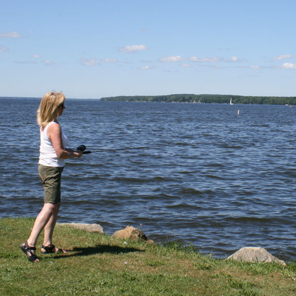 A woman fishes at Pymatuning