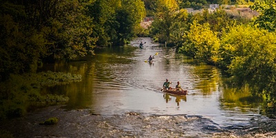 Canoe and kayakers at uck Creek along the ECO Sports Corridor