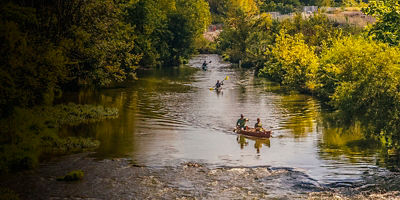 Canoe and kayakers at uck Creek along the ECO Sports Corridor