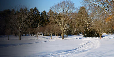Cross country skiers ski tracks at  Cushing memorial park Framingham 